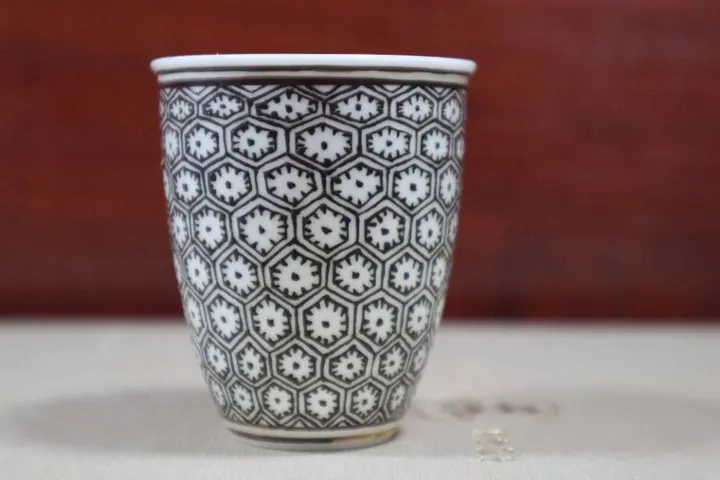 手绘柴窑米黄釉编织纹品茗杯